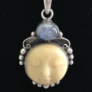 Silver and ivory moon face necklace